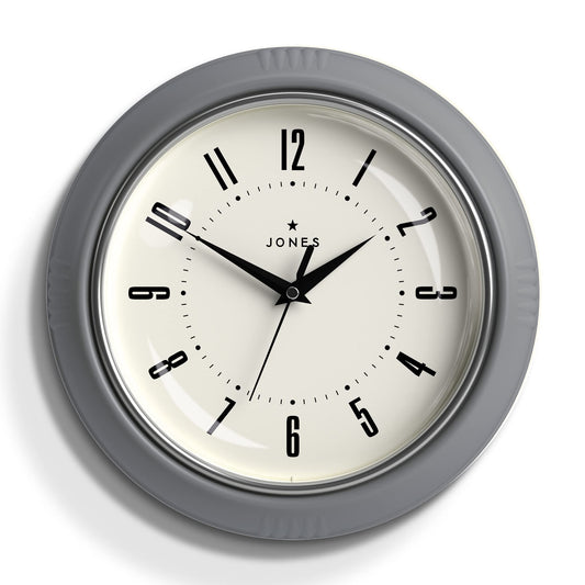 Jones Clocks® Ketchup Clock – Retro Wall Clock. Round clock with easy-to-read numbers for kitchen clock, office clock, living room clock. Size: Small clock, 25cm. Colour: Grey clock.